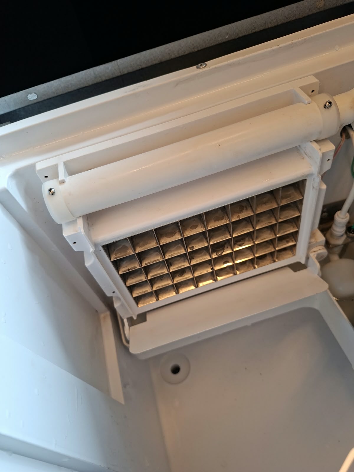 Detalhe interno de uma máquina de gelo
